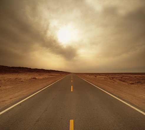 An open road at sunset